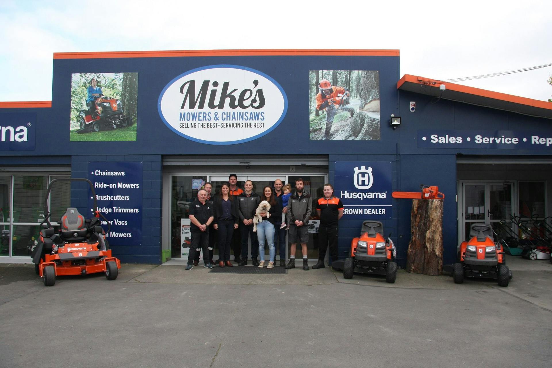 Staff outside Mikes Mower Store